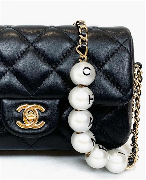 chanel pearl bag|chanel bag with pearl chain.